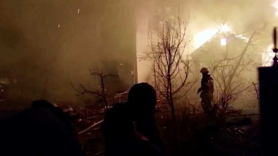 Rescuers in the rubble of destroyed homes Zhytomyr