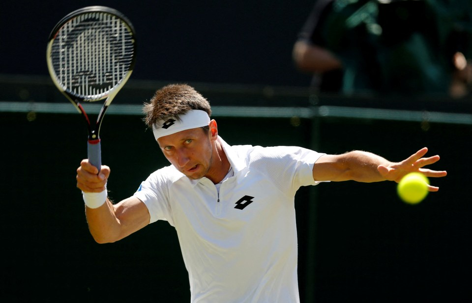 Sergiy Stakhovsky plays at Wimbledon in 2017