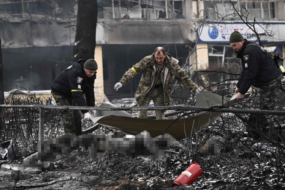 Horror pictures show the charred bodies of Ukrainian civilians killed in a Russian airstrike