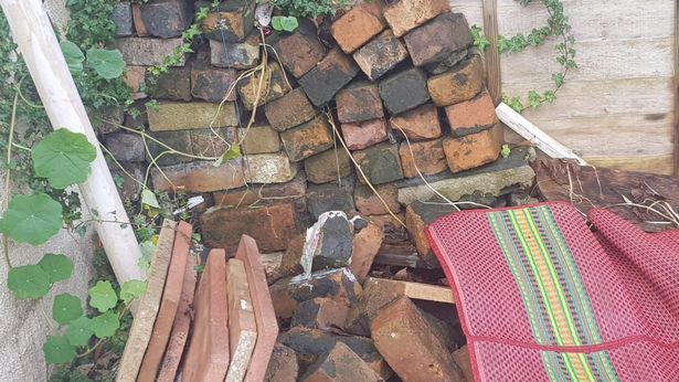 Fadumo begged her landlord to fit a new fence in the garden - but he says there is nothing wrong with it