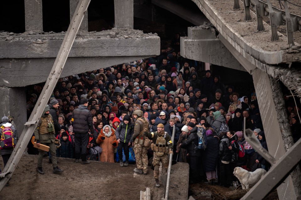 People in Irpin, Kyiv, hiding under a destroyed bridge