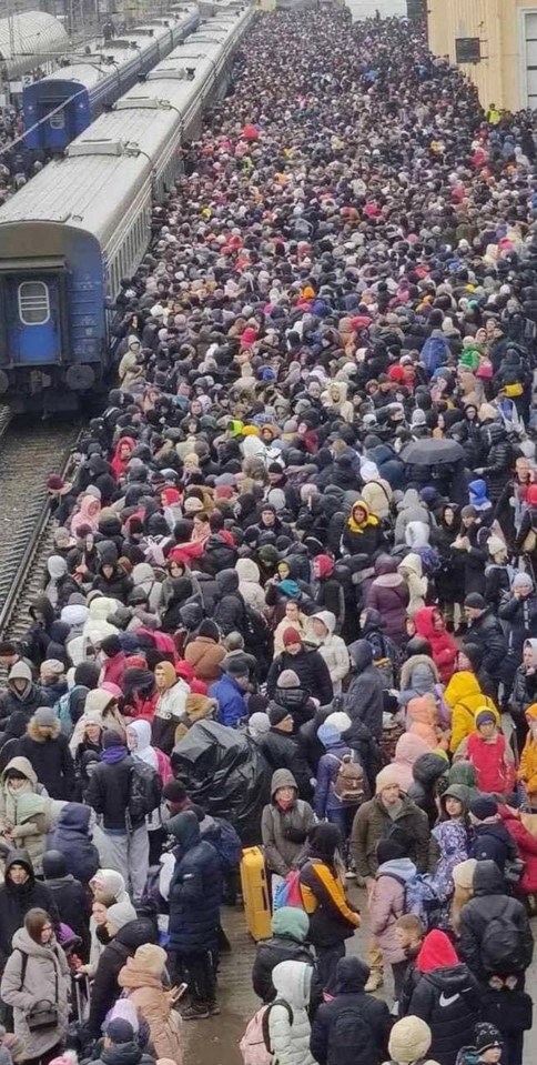 Crowds of civilians gather at Kharkiv railway station to flee from the Russians