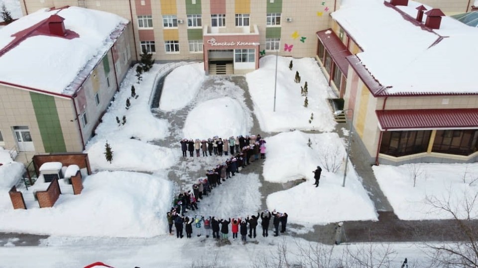 Children from a cancer hospice were made to line up in the "Z" symbol in the latest propaganda move