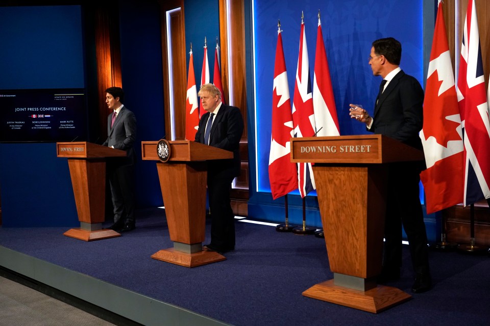 Justin Trudeau, Boris Johnson and Mark Rutte at a press conference this afternoon