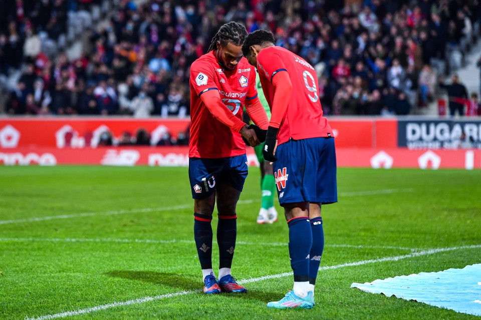 The two Lille attackers replicate the famous handshake celebration