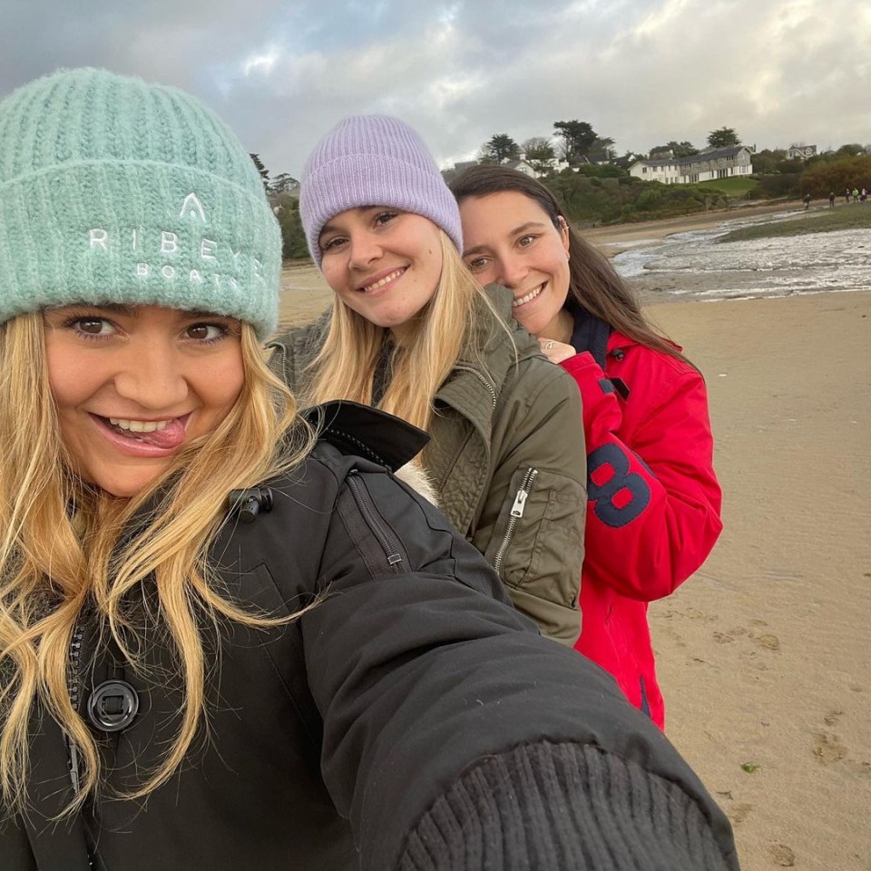 Holly shared a snap with her two sisters Tilly and Megan