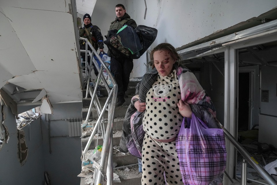 She was seen carrying her belongings out of the bombed hospital in Mariupol