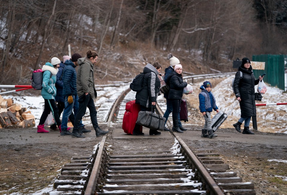 They arrived in Kroscienko by car after a mammoth journey as the total number of refugees fleeing Putin's troops passed 2.3million on day 14 of the war