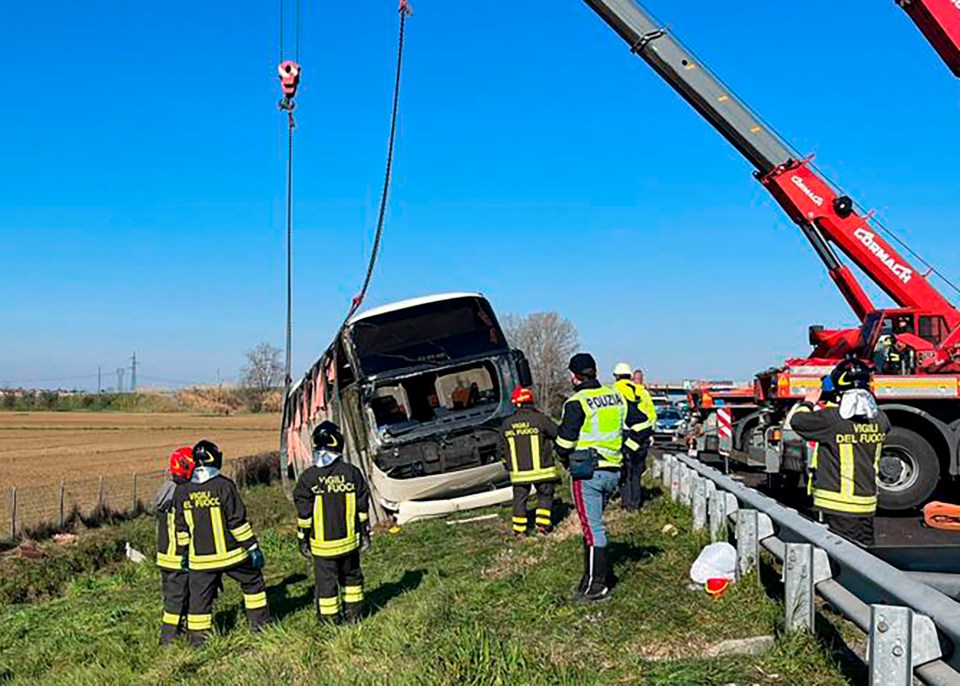 Italian firefighters used two cranes to stand the vehicle back up