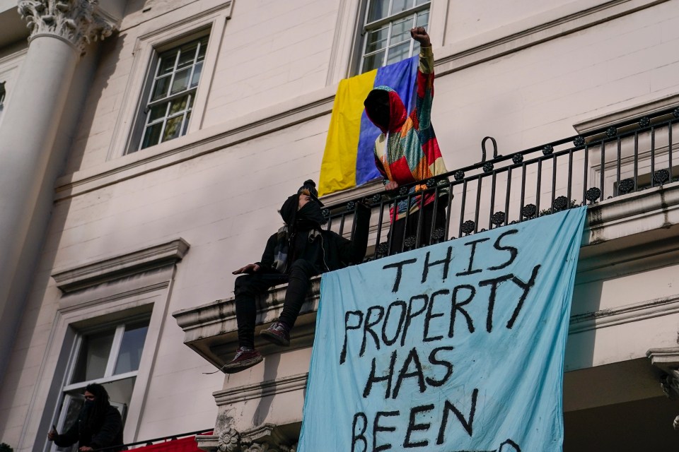 A Ukrainian flag has been flown from the upstairs window of the house