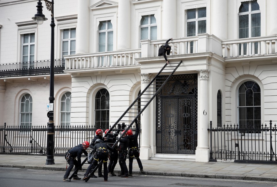 Riot police stormed the house in Belgravia on Monday afternoon