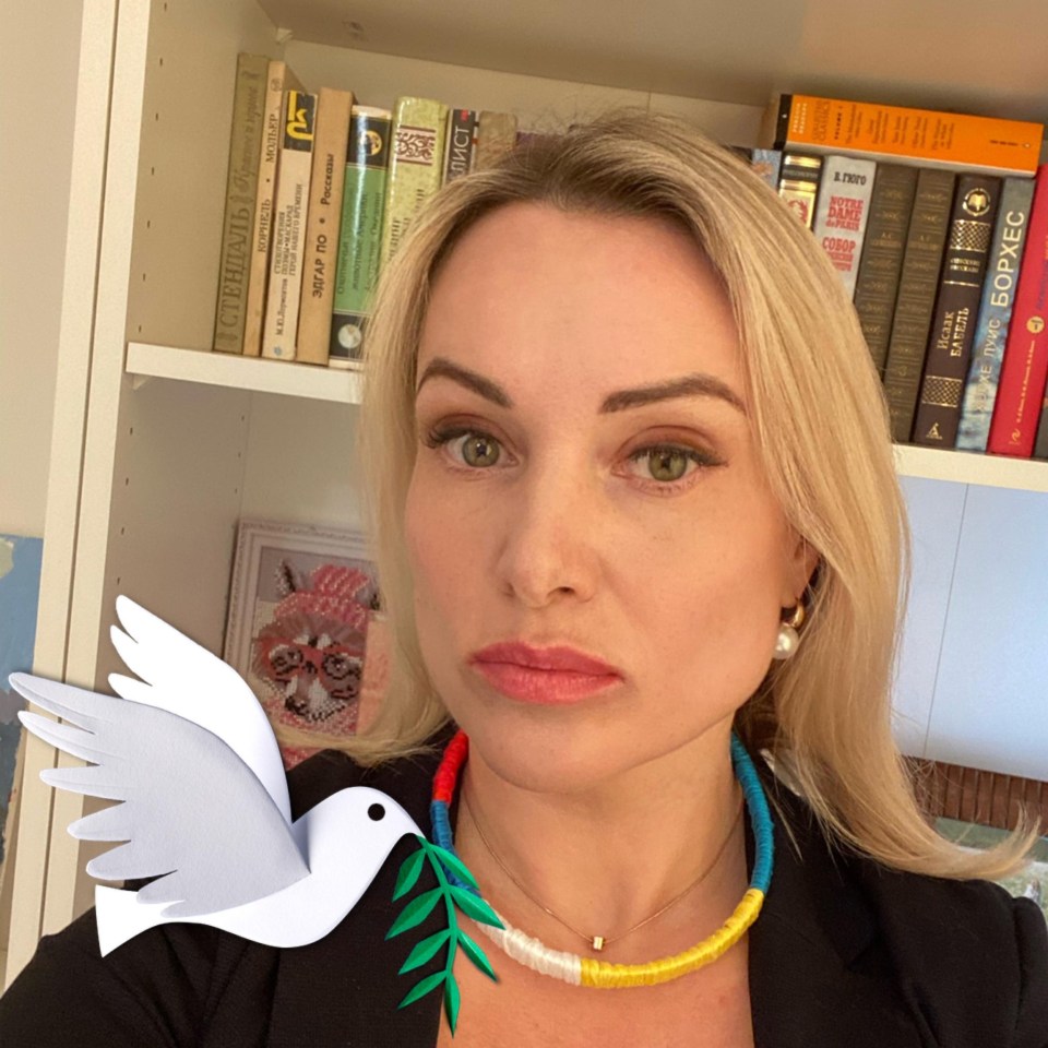 Her Facebook profile picture, changed yesterday, includes an icon of a dove with an olive branch - the symbols of peace