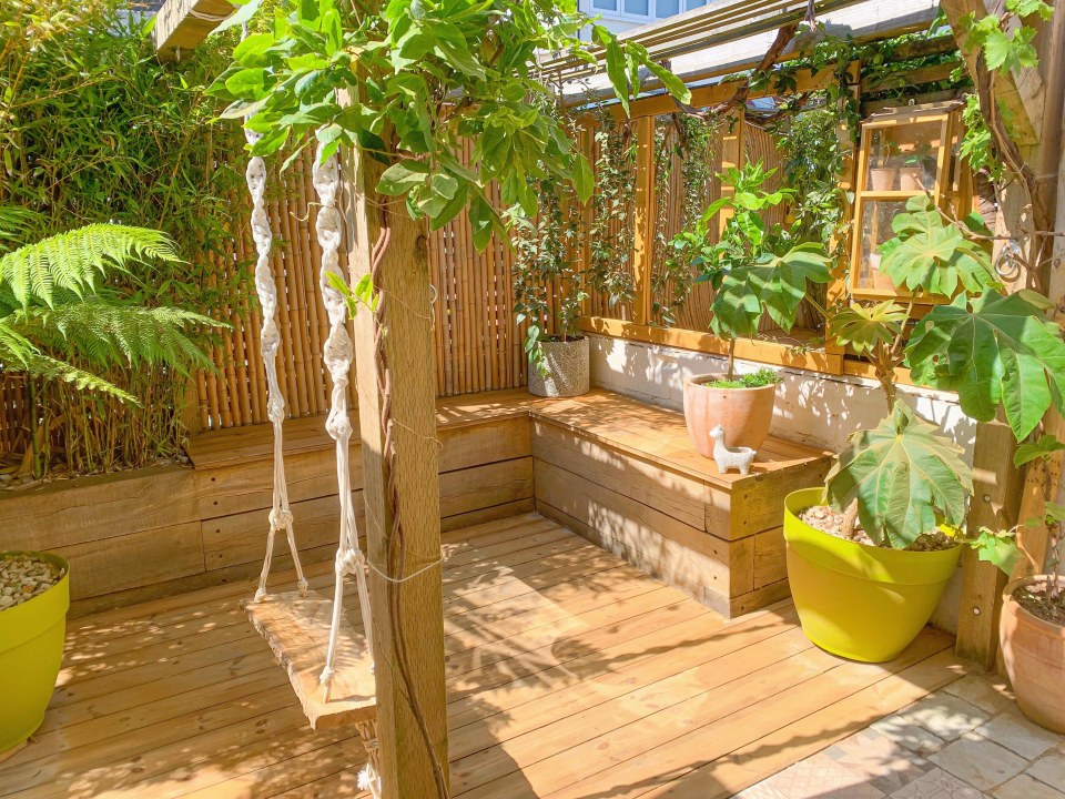 Decking and even an outdoor shower can be found in the garden