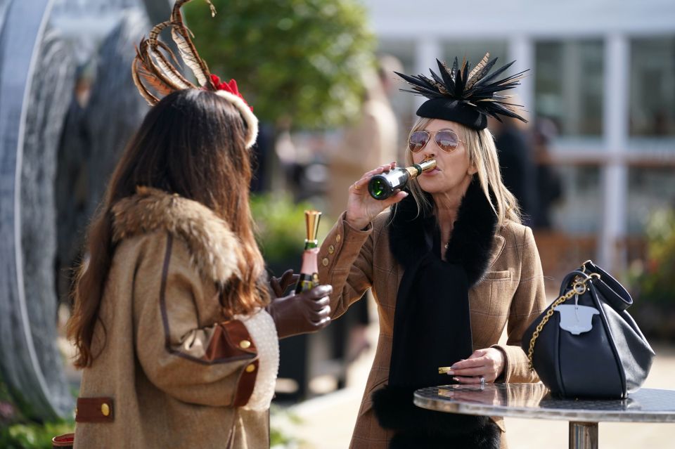 Fans enjoy a drink on day one of the festival