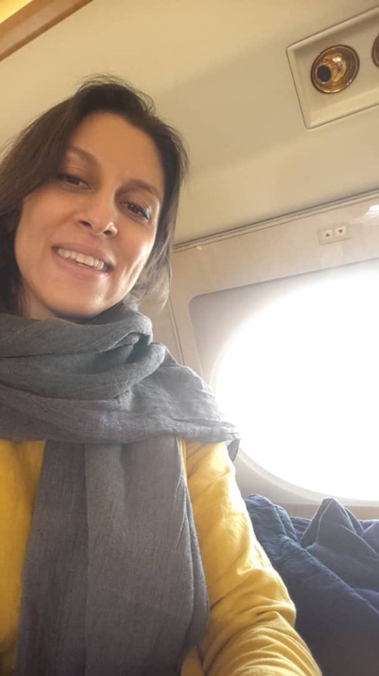 Nazanin smiling on board her freedom flight home