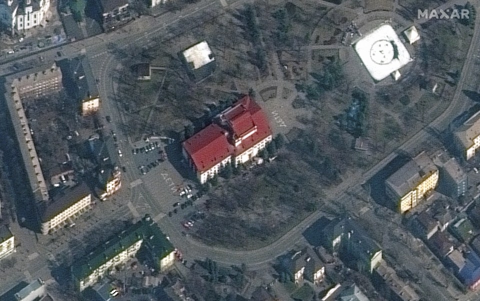 Satellite images showed the word 'children' written in large white letters outside the theatre