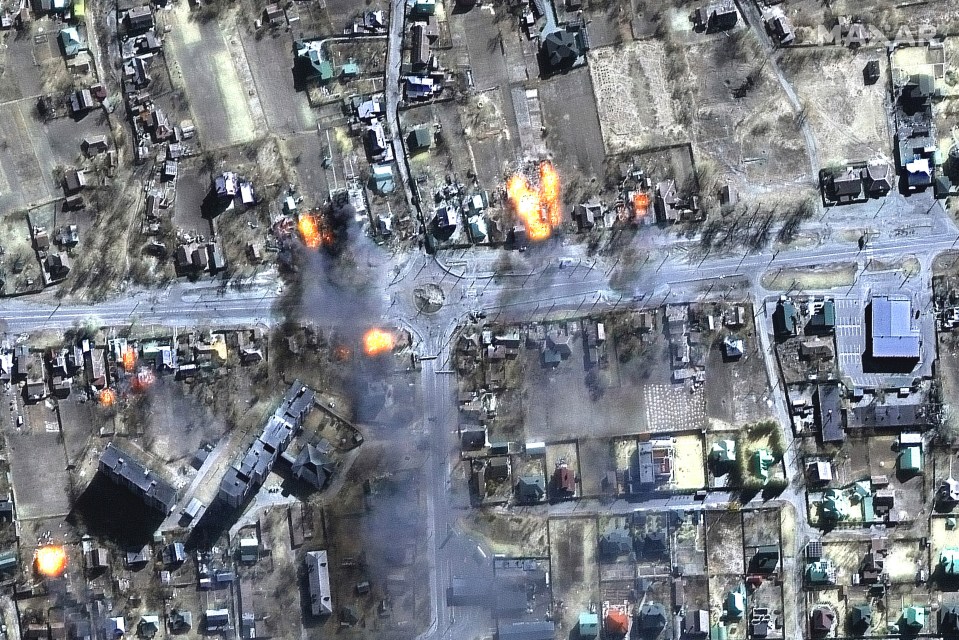 Satellite image from Maxar Technologies shows burning buildings in a residential area in northeast Chernihiv