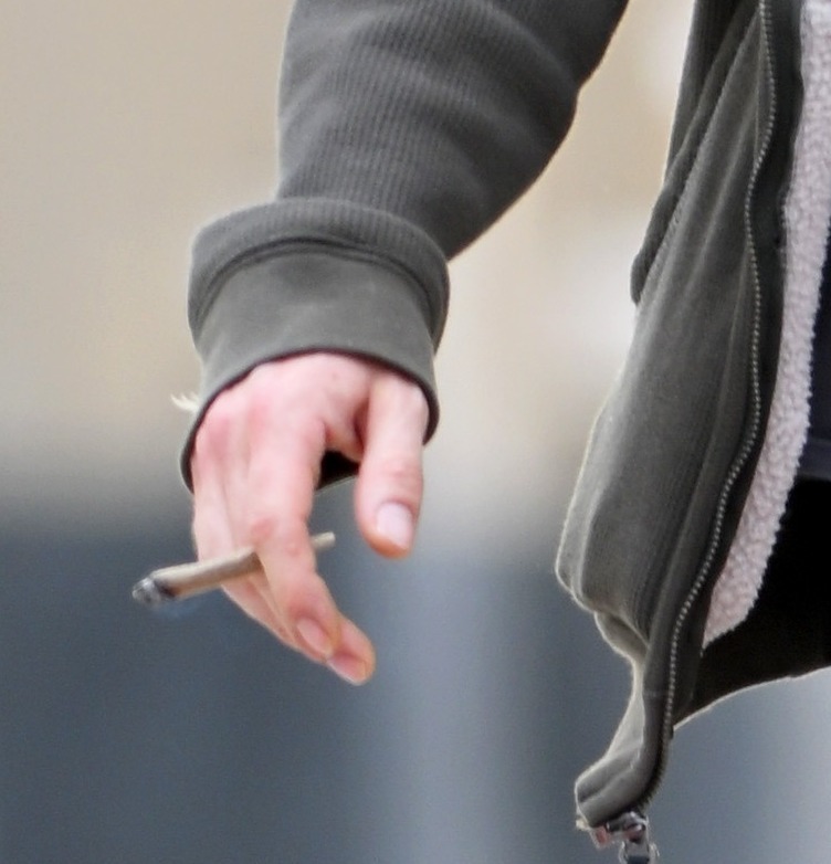 The actor was carrying a roll-up cigarette