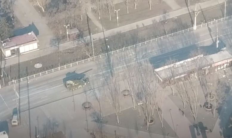 Drone footage shows a Russian Z tank being targeted on a street in Mariupol