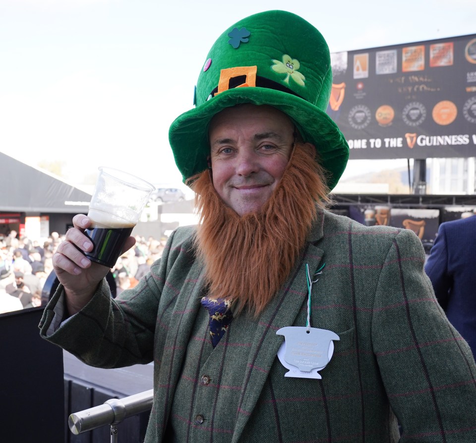 Denis Courtney toasts with a pint in the Guinness village