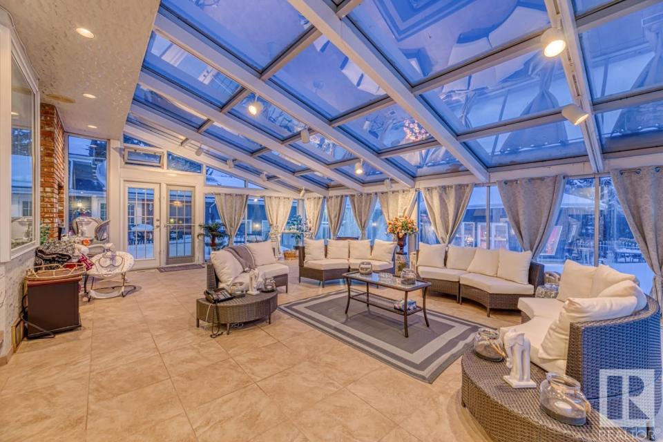 A large conservatory is thrown into the vast Canada home