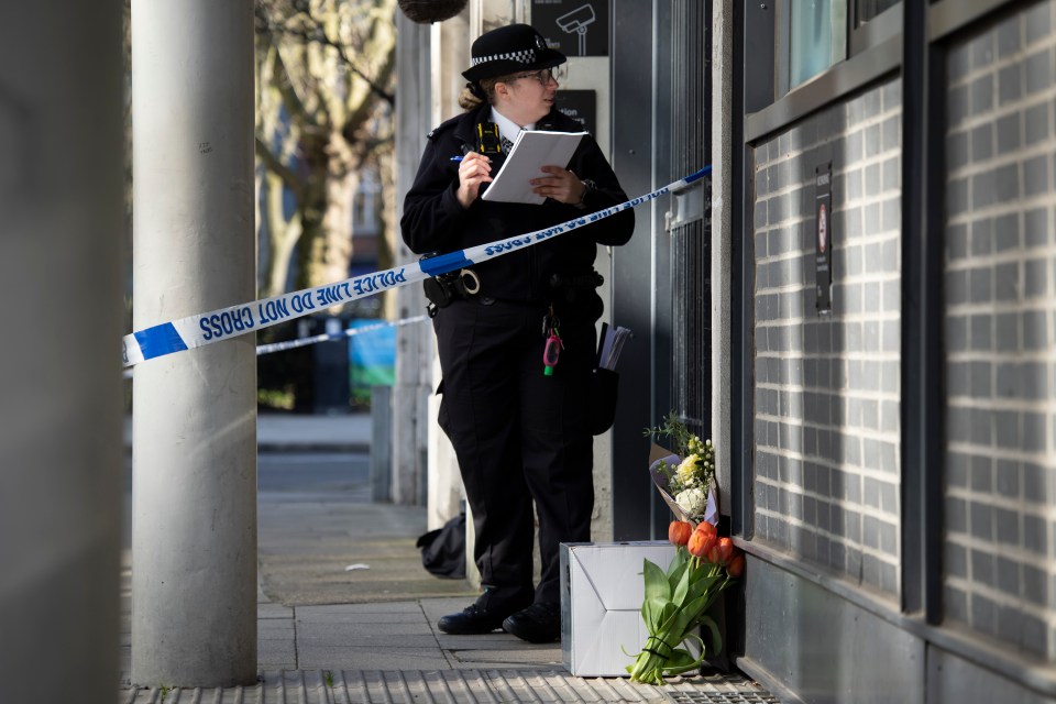 Flowers left at the scene as police investigate