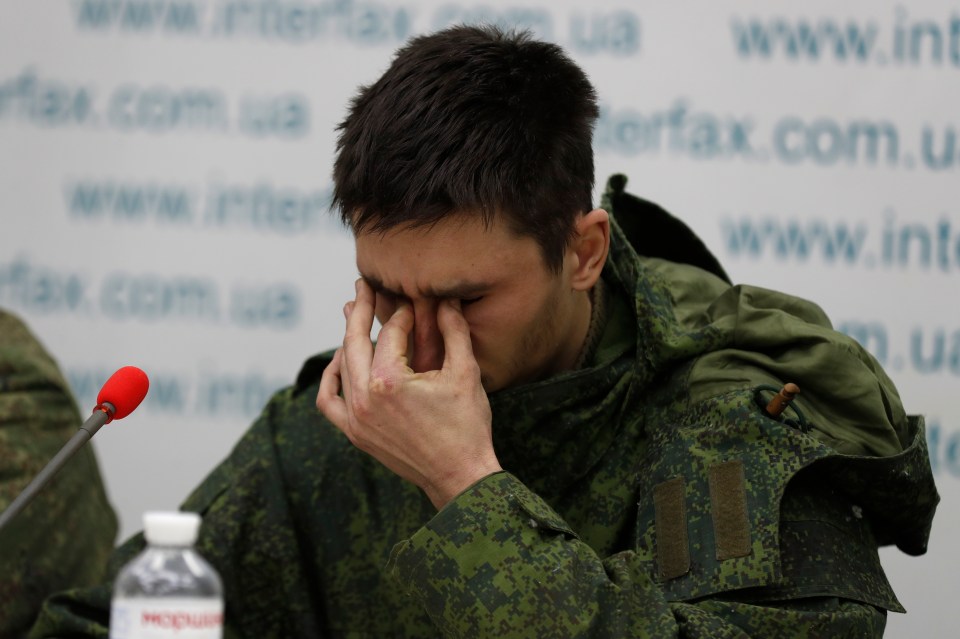 A captured Russian soldier broke down in tears at a press conference