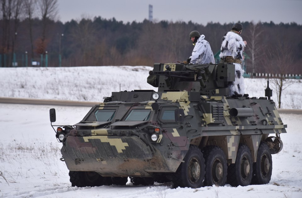 A Russian tank has been blown up by a Ukrainian BTR-4 armoured personnel carrier