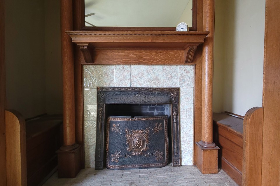 The large living room comes with a fireplace