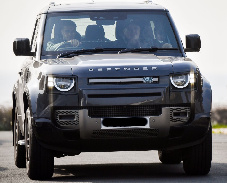 He was joined in the huge car by his dad John