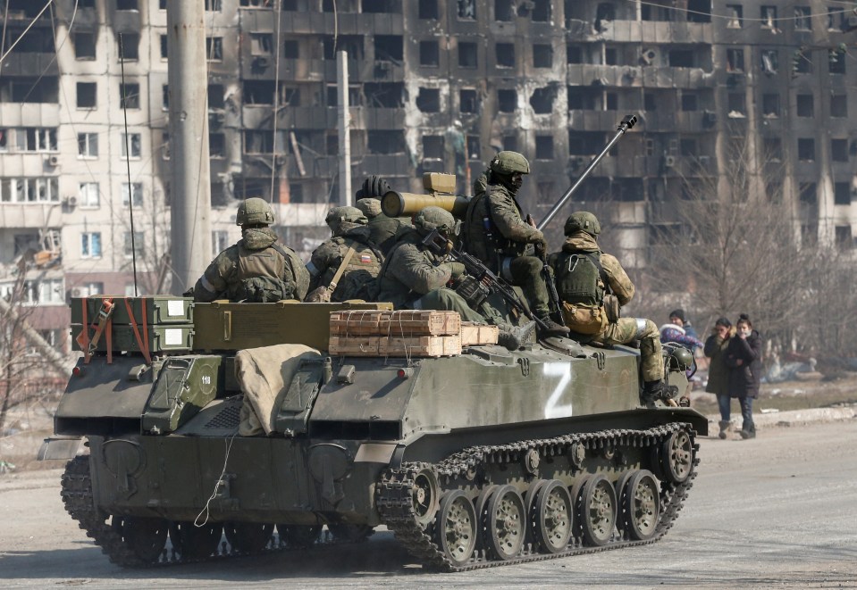 Russian troops in the besieged southern port city of Mariupol