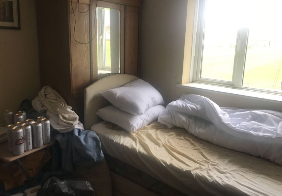 Cans of beer still sit on the bedside table in the property