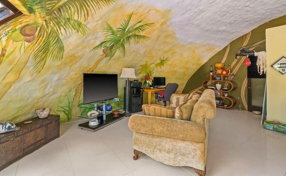 Inside, the walls are adorned with colourful painted palm trees to match the vibe