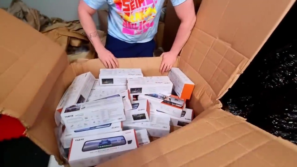 He unboxed an entire box of dash cams, though it's unsure if they work