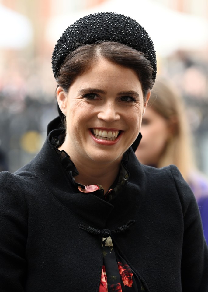 Princess Eugenie beams as she arrives at Westminster Abbey