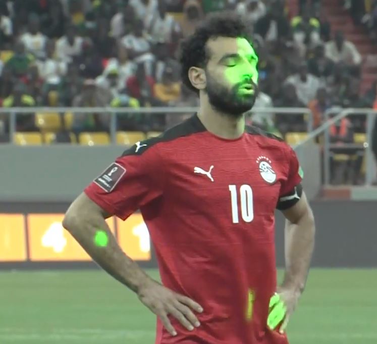 Mo Salah was targeted with laser pens in shocking scenes at the World Cup qualifier against Senegal