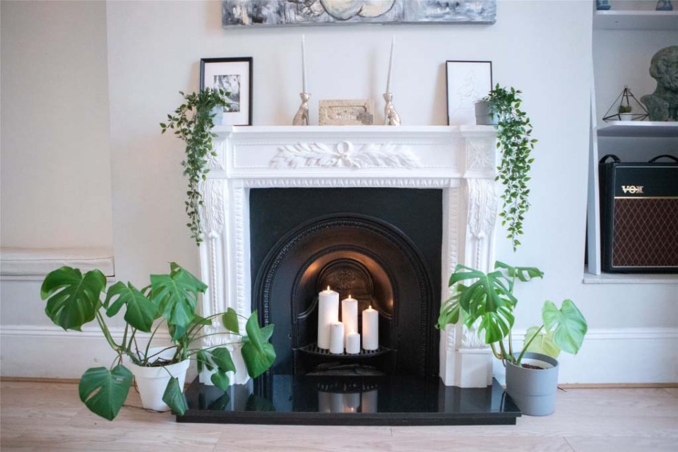 A large fireplace takes pride of place in the lounge