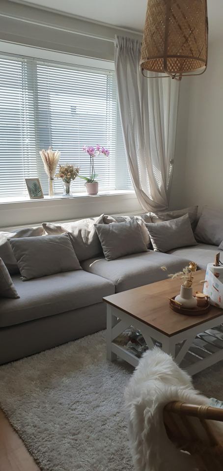 Now, the room looks modern and fresh thanks to a lick of paint and rattan accessories