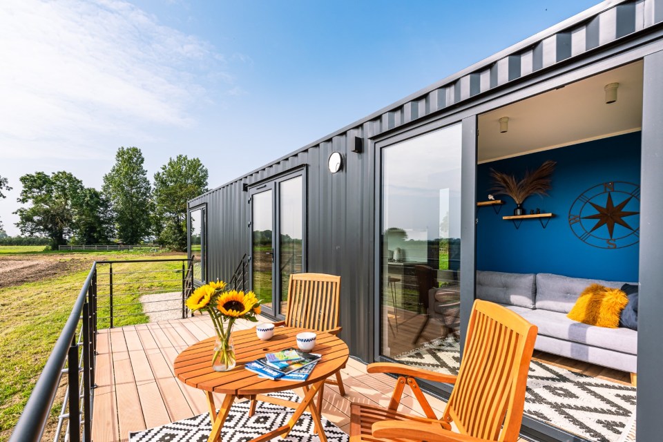 Box BNB is a trio of refurbished shipping containers that look out across a peaceful farming field