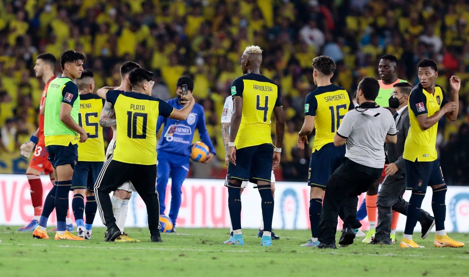 A pitch invader tried to take a video with Messi