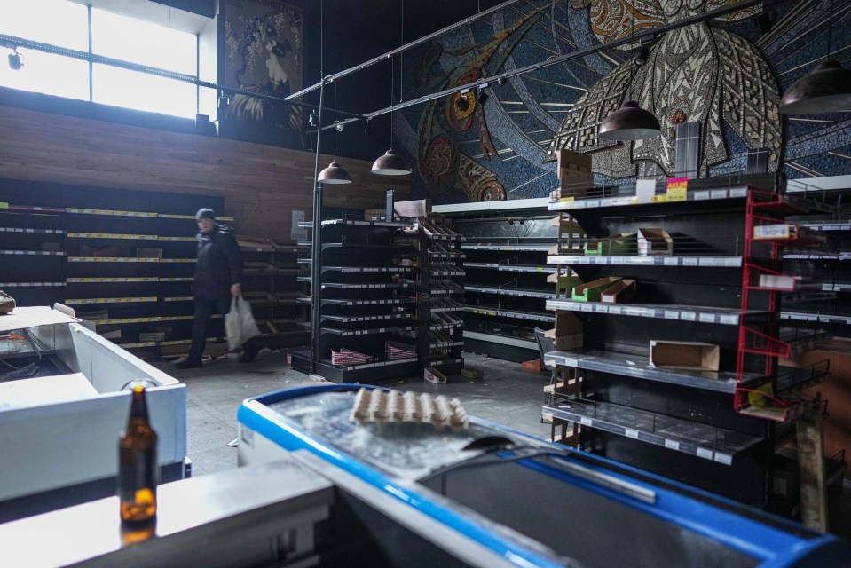 Shops have been stripped bare by looters in Mariupol