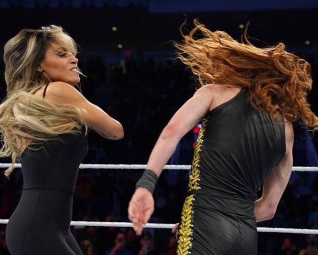 WWE legend Trish Stratus returned and slapped RAW Women’s Champion Becky Lynch