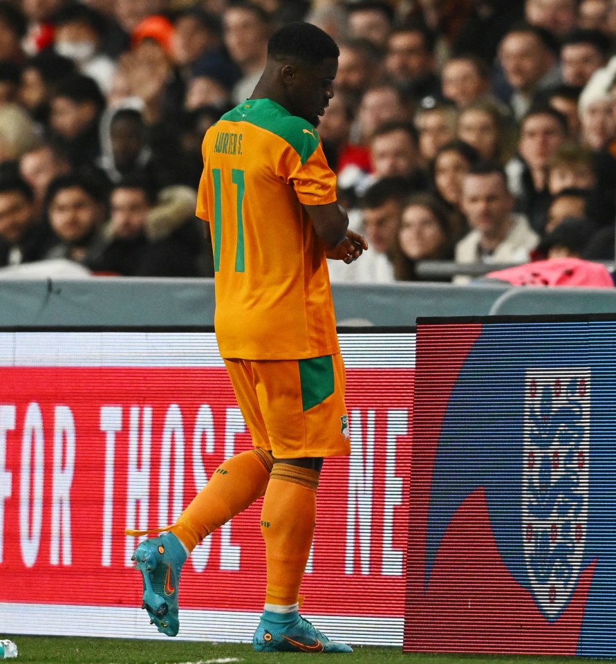 Serge Aurier trudges off after being shown a red at Wembley