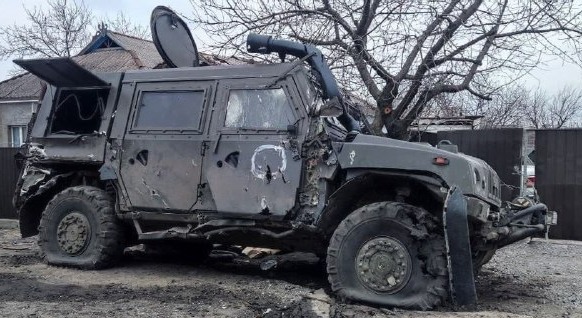 Burned-out Russian vehicles on the road to Mariupol