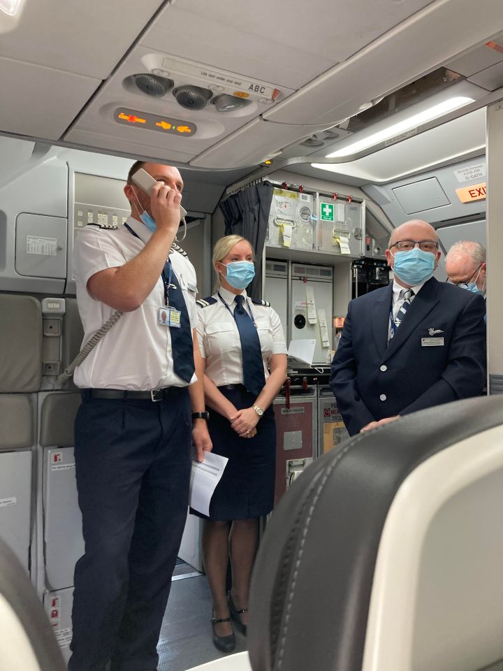 BA staff welcoming guests onboard one of their new budget flights from Gatwick