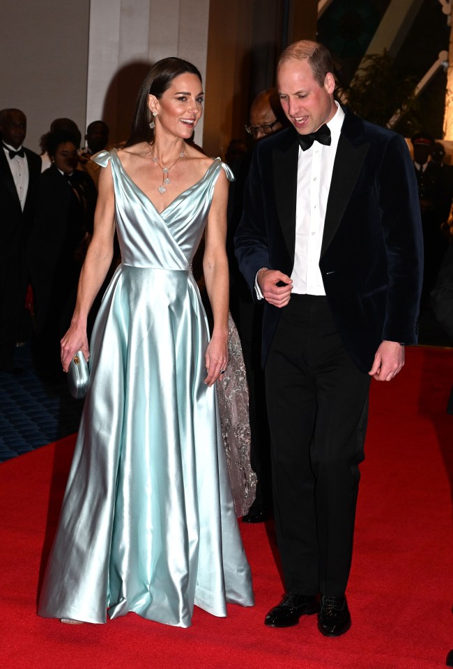 Kate dazzled in an elegant silver dress at a black tie do with Prince William during the last leg of their royal tour