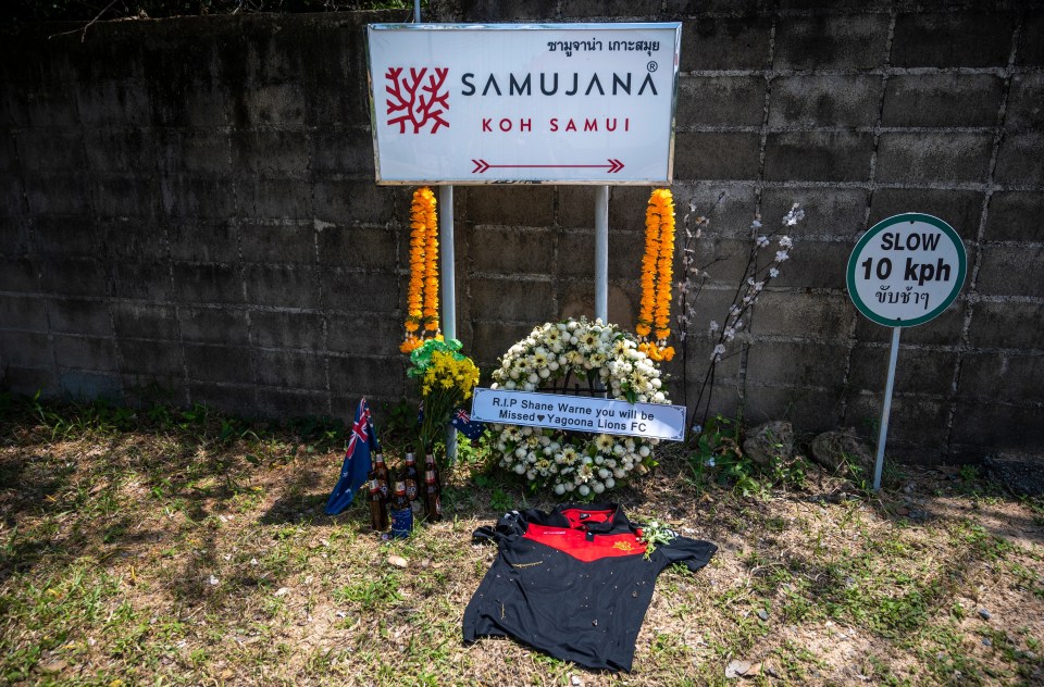 A wreath, flowers and beers were left at the Samujana Villas where Warne died