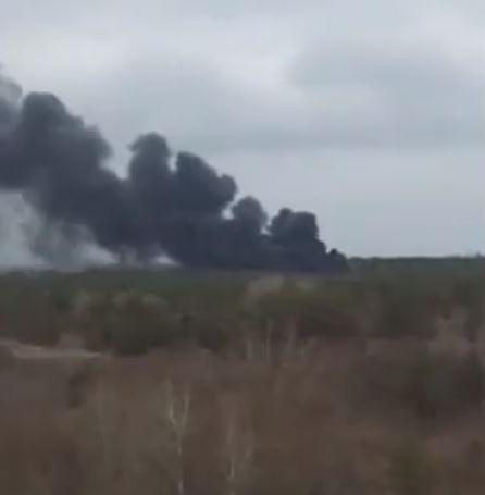 Enormous clouds of black smoke rising from the city of Enerhodar