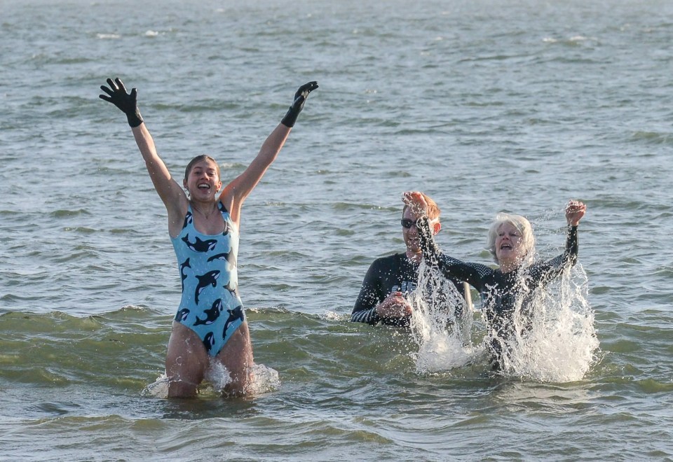 Early morning swimmers have fun in the sea at Tynemouth Longsands beach on Saturday