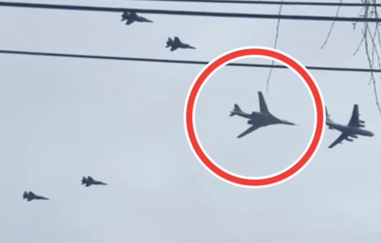 It comes after one of Putin’s TU-160 nuclear bombers (ringed) was seen flying close to the Ukraine border